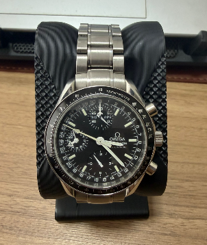 Speedmaster day date automatic triple date